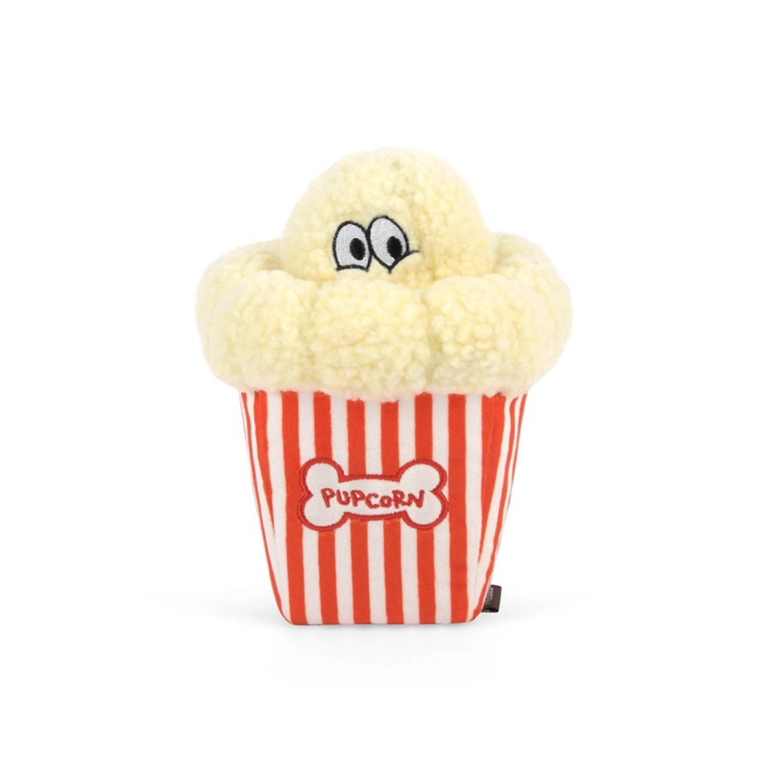 Punavalkoraidallinen koiran pehmolelu popcornikuppi, punavalkoiset raidat ja silmät, teksti “Pupcorn” edessä.